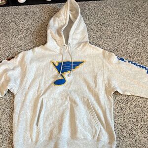 Champion Gray Hoodie with Blue and Yellow Design